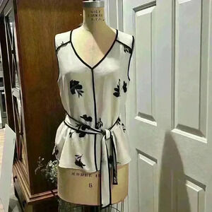 Vince Camuto V-neck sleeveless top. Size S, Fits like a medium.